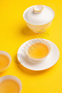 黄色背景的茶汤背景图片