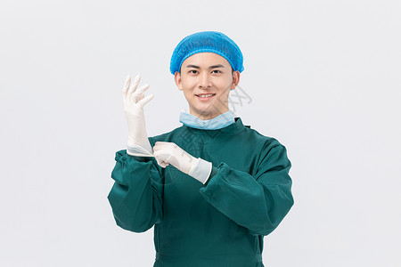 穿手术服戴手套的医生形象图片