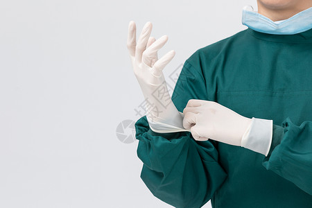 穿手术服戴手套的医生形象图片