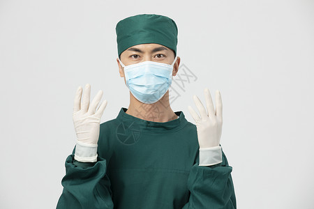 抗疫手术服男性医生形象背景图片