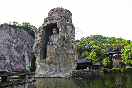 弥勒佛塑像绍兴柯岩的弥勒佛石像背景