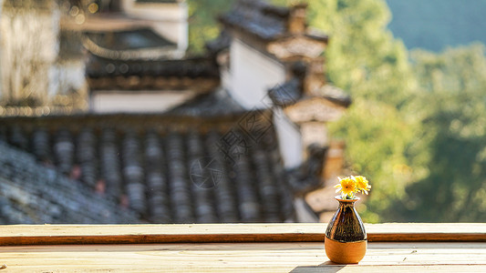 窗台花瓶窗前阳光下的小花瓶背景