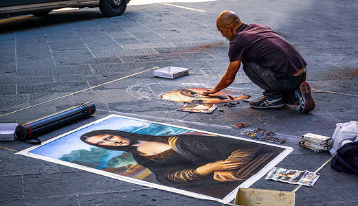 街头画家欧洲街头地面油画艺术画家背景
