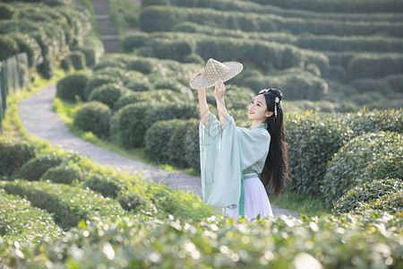 汉服古装美女拿斗笠跳舞背景图片