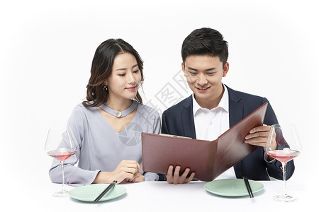 年轻情侣约会餐厅点餐图片