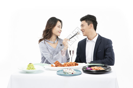 年轻情侣一起吃饭背景图片