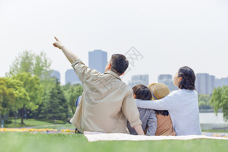 一家人野餐一家人户外郊游背景背景