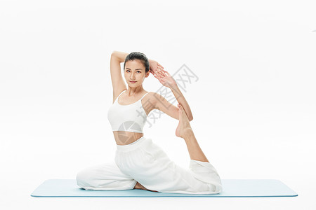 普拉提姿势年轻女性瑜伽动作背景
