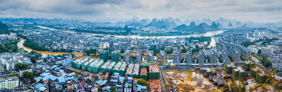 全景航拍夏季暴雨洪水围城内涝建筑群图片