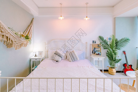 民宿明亮温馨的卧室背景图片