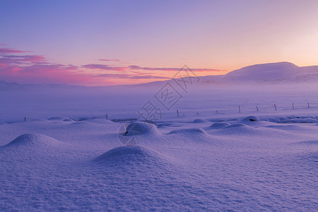 雪的纹理冰岛日出迷人自然美景背景