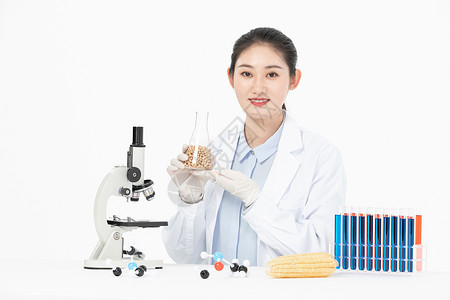 女性生物学家研究转基因食物背景图片