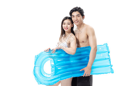 青年夏日情侣拿着游泳板背景图片