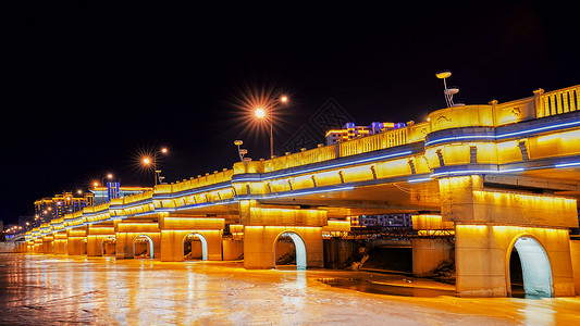 布尔汉延吉大桥布尔哈通河夜景背景