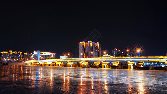 布尔哈斯冬季延吉布尔哈通河夜景背景