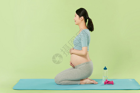 孕妇普拉提孕妇瑜伽运动休息背景