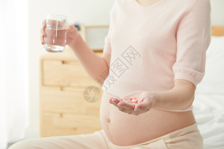 母亲生病孕妇吃药背景