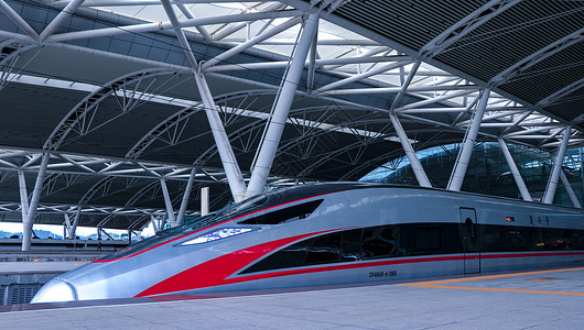 广州南站驶出的高铁动车复兴号背景图片
