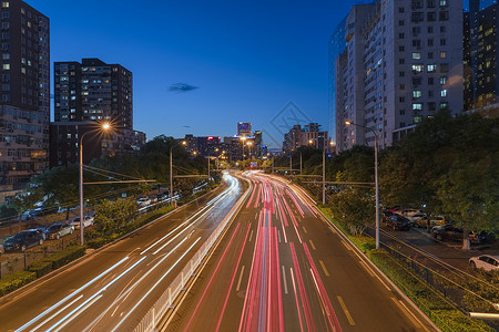 门内门外夜景北京安定门外大街交通背景