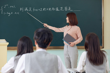 东亚人学习中学生认真听教室授课背影背景