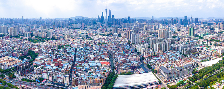 航拍广州城中村大塘村与繁华都市建筑对比背景