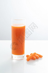 鲜榨胡萝卜汁背景图片