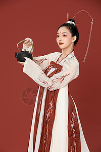 中国风汉服古风美女提茶壶图片