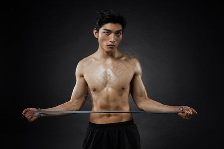运动男性拉力绳训练背景图片