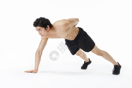 腹肌训练的运动男性背景图片
