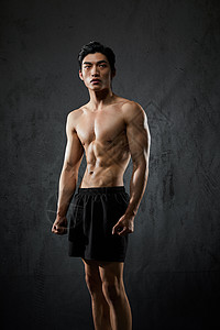 健身男性肌肉展示形象背景图片