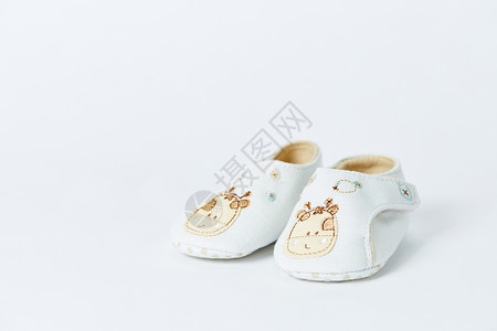 婴儿鞋子母婴婴儿鞋背景