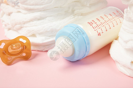 带奶嘴奶瓶母婴用品背景