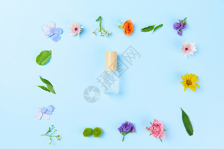 创意色彩花朵化妆品背景图片