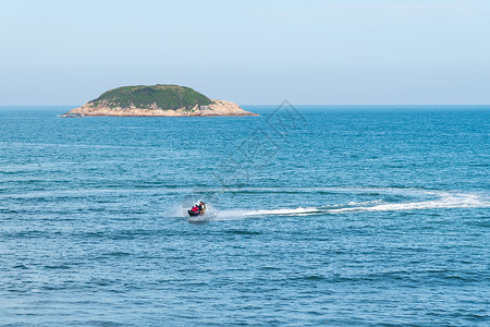 海阔天空背景海水快艇运动娱乐背景