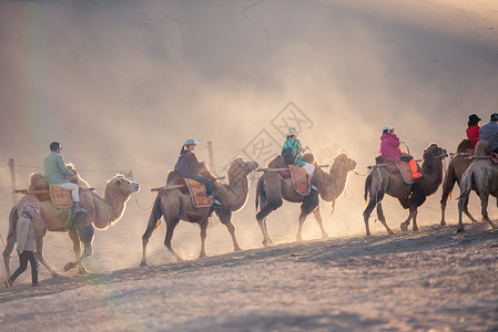 骆驼骑马敦煌鸣沙山沙漠背景
