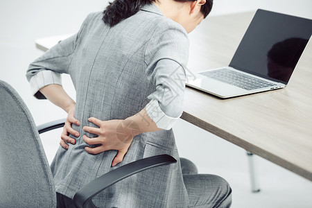 白领商务女性腰酸背痛图片