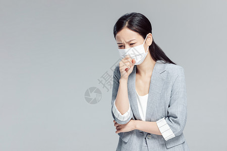 亚健康商务女性职业病咳嗽戴口罩的商务女性咳嗽背景