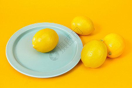 圆圆黄色大太阳夏日水果柠檬场景背景
