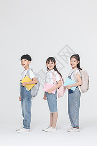 背包上学男孩儿童手拿书本准备上学背景