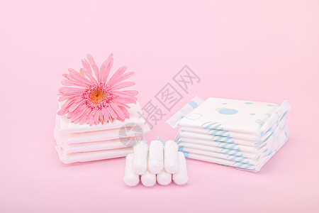 护垫粉色背景上的女性卫生用品背景