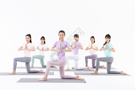 团队瑜伽年轻美女瑜伽锻炼背景