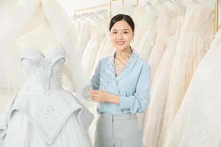 婚纱设计师制作婚纱形象时尚服装设计师形象背景