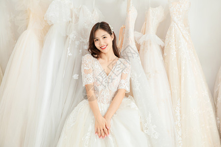 婚纱店甜美新娘形象背景图片
