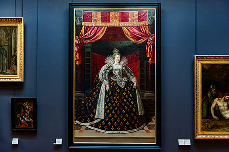 玛丽转身法国巴黎卢浮宫油画玛丽·德美第奇在加冕长袍背景