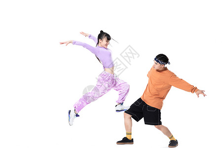 年轻街舞男女斗舞背景图片