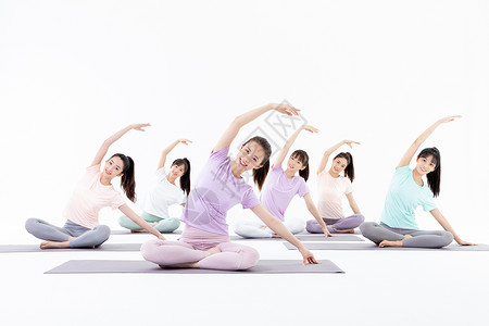 团队瑜伽年轻美女运动热身背景