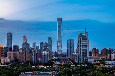 蓝天白云房子北京国贸CBD夜晚背景