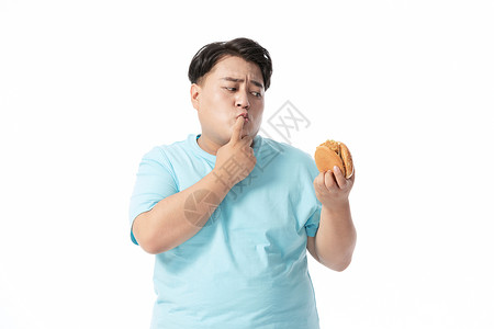 肥胖男士犹豫要不要吃汉堡图片