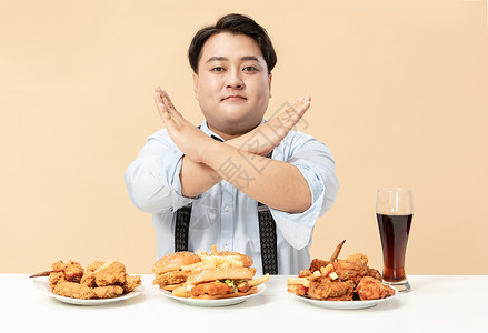 拒绝肥胖旁男生拒绝高热量食物背景