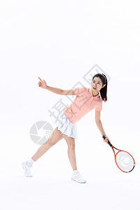 运动女性打网球图片